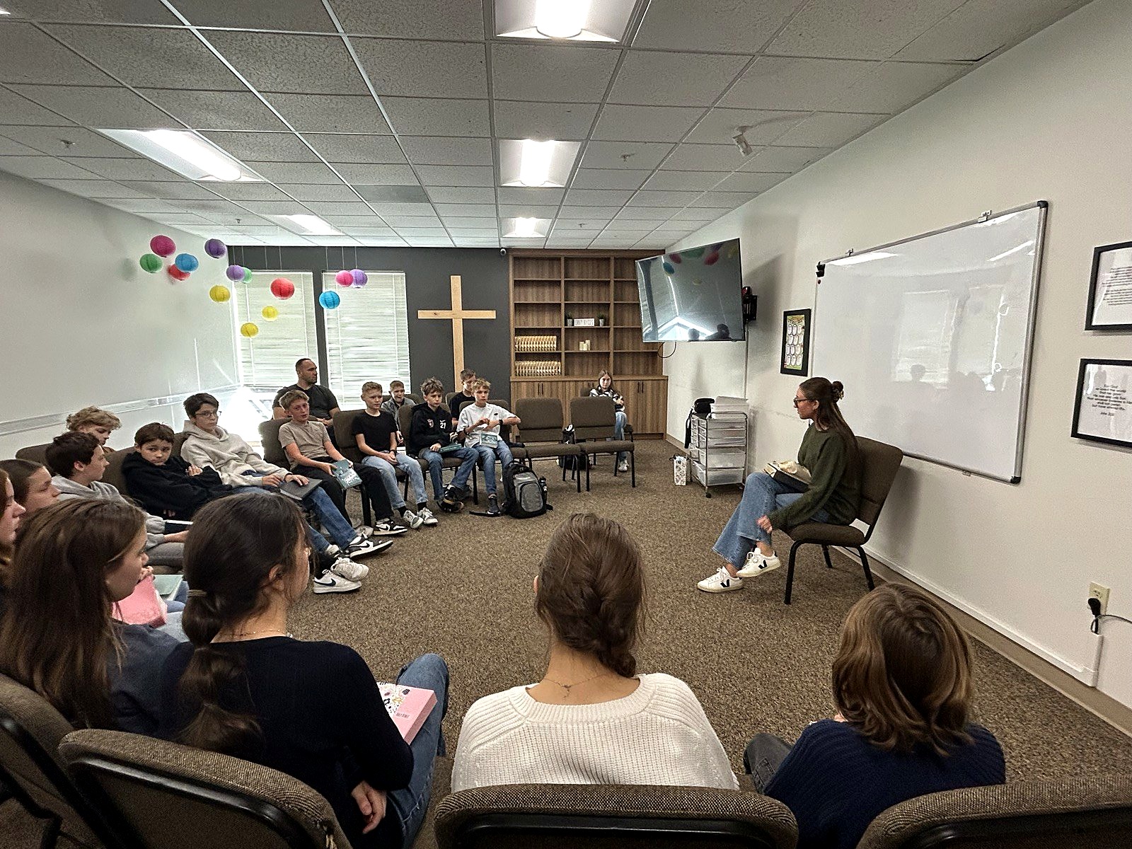 Students gathered in a circle for an after-school Bible study discussion