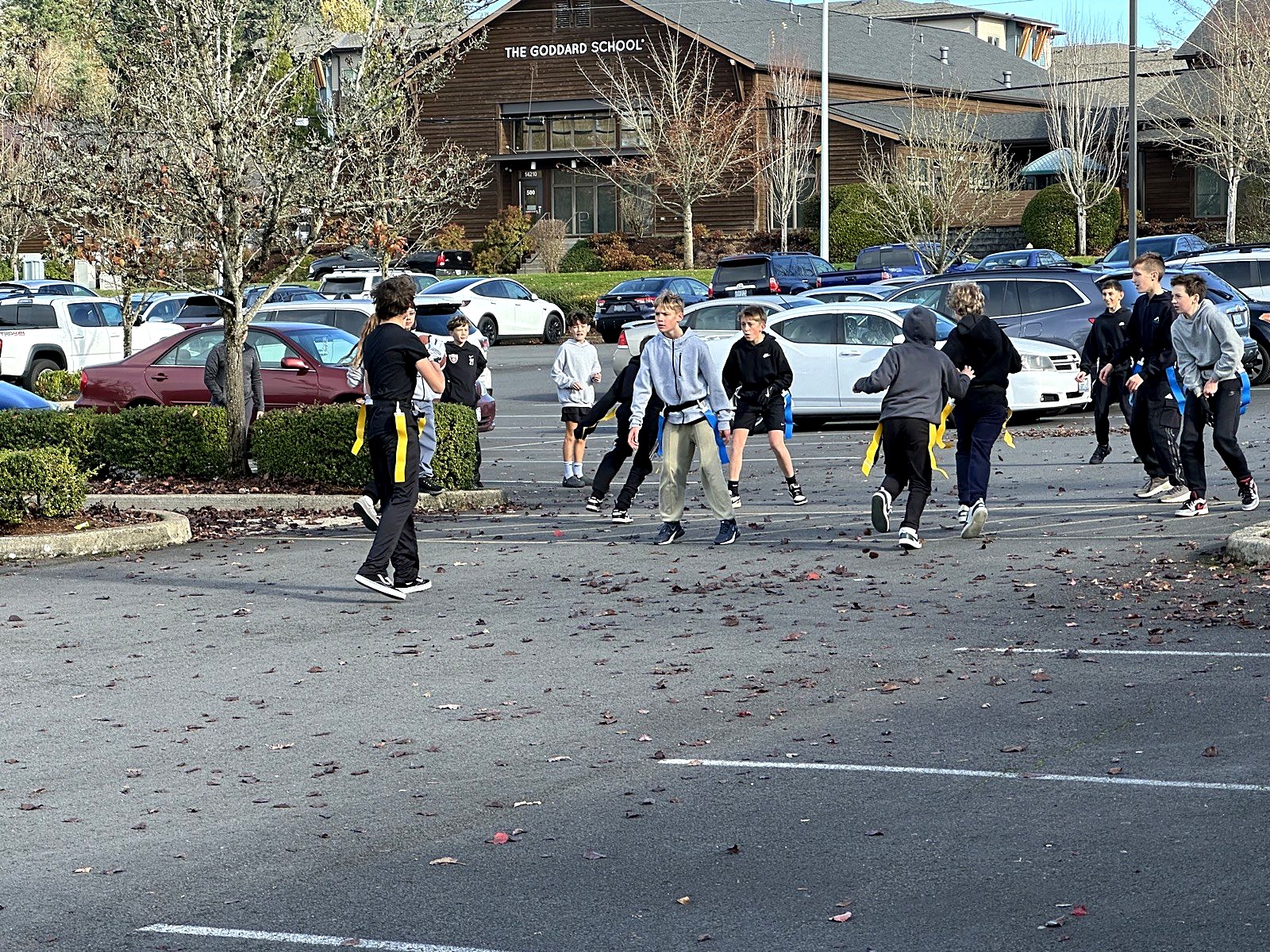 Spring Mountain students playing flag football together outdoors